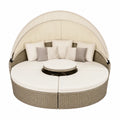 Lit de jardin rond en résine tressée avec coussins beige et gris, diameter 180 cm